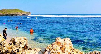 Pantai Karang Tawulan Rute Menuju Lokasi Dan Harga Tiket Masuk